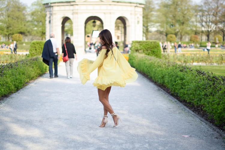 Yellow ruffle swing dress in park