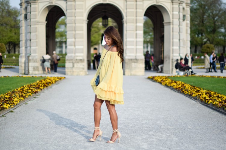 Yellow ruffle swing dress beige high heels
