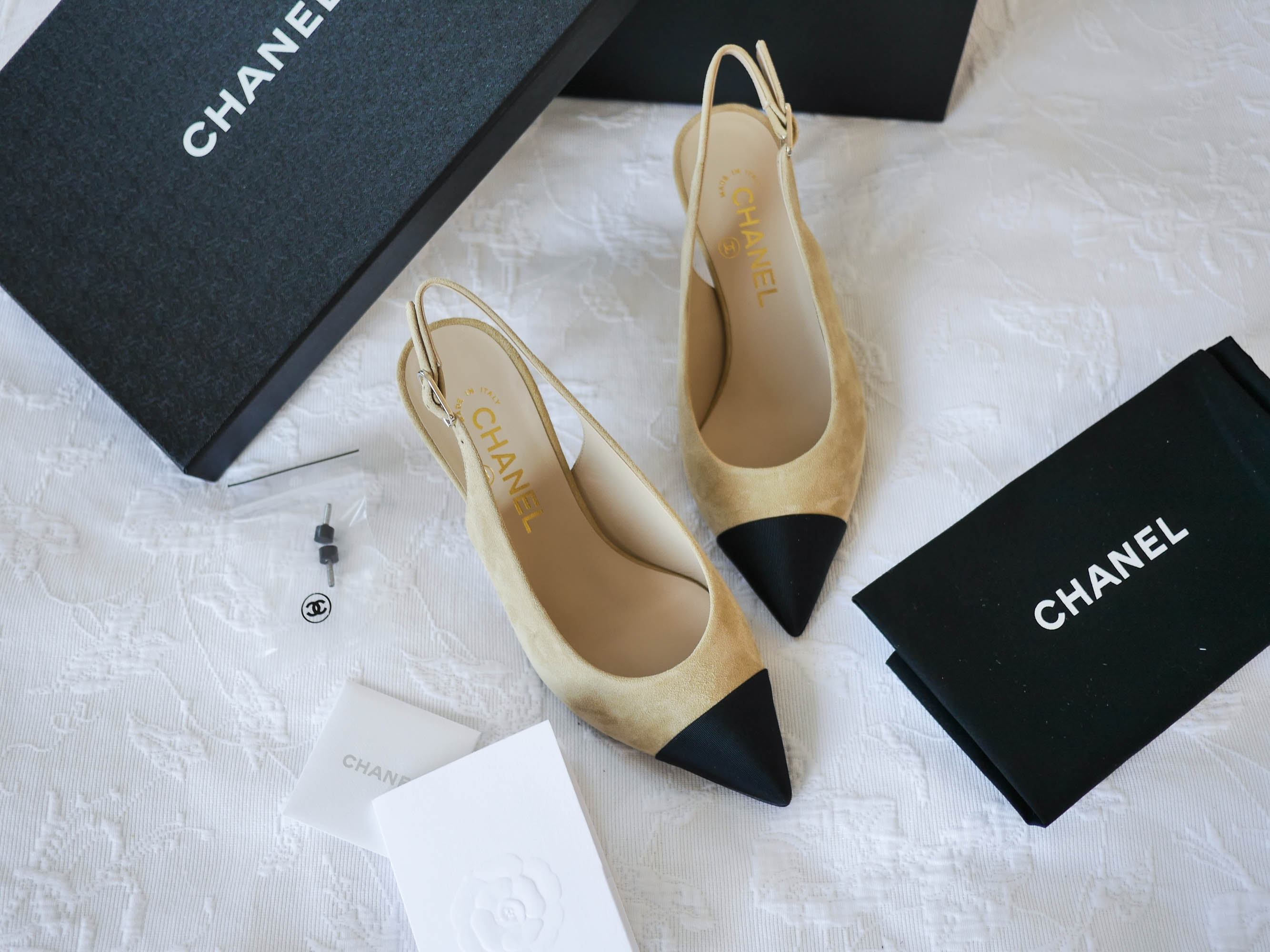 White Dress and Chanel Slingback Pumps